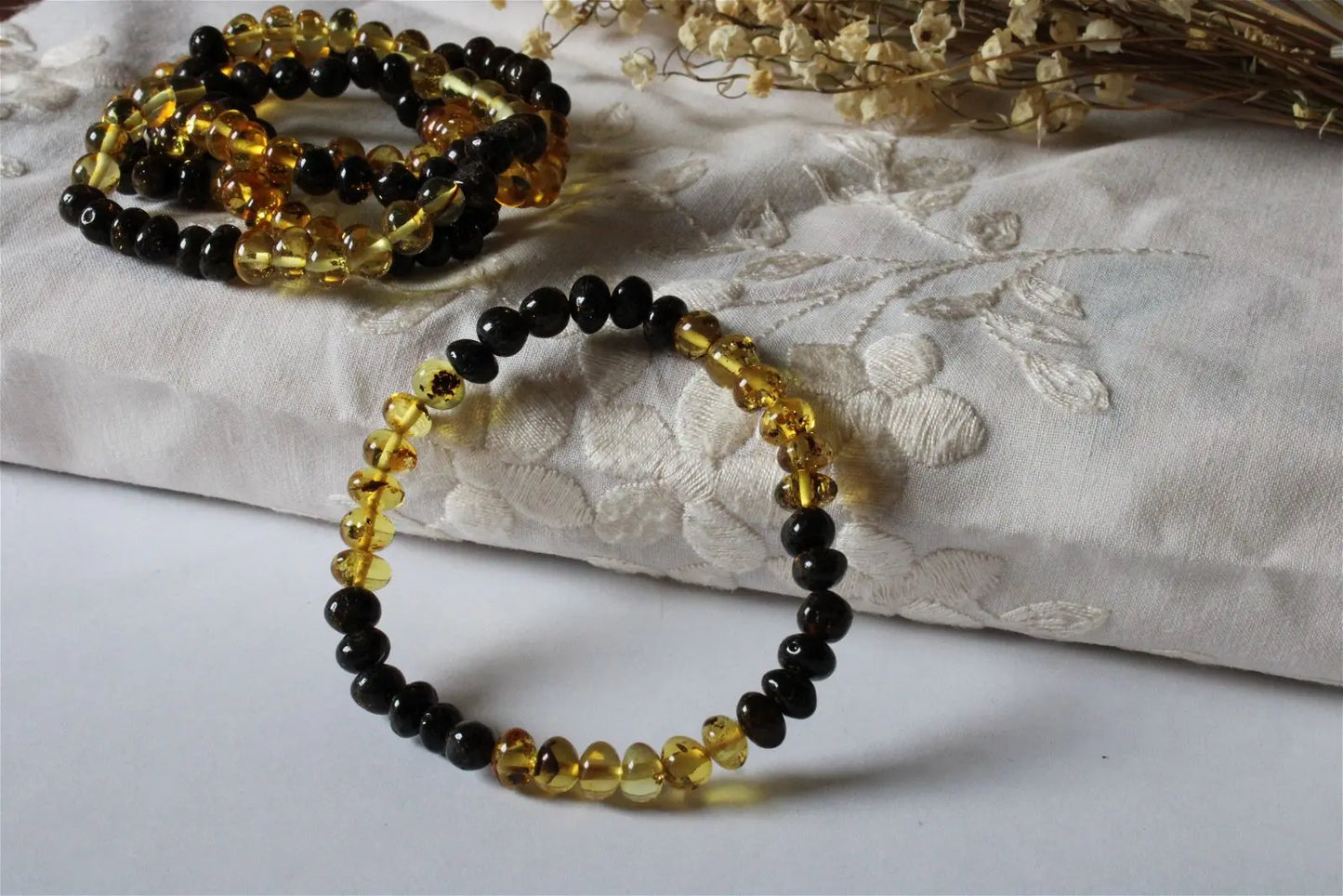 1 Bracelet ambre certifié vert bicolore Lituanie - Aurore Lune