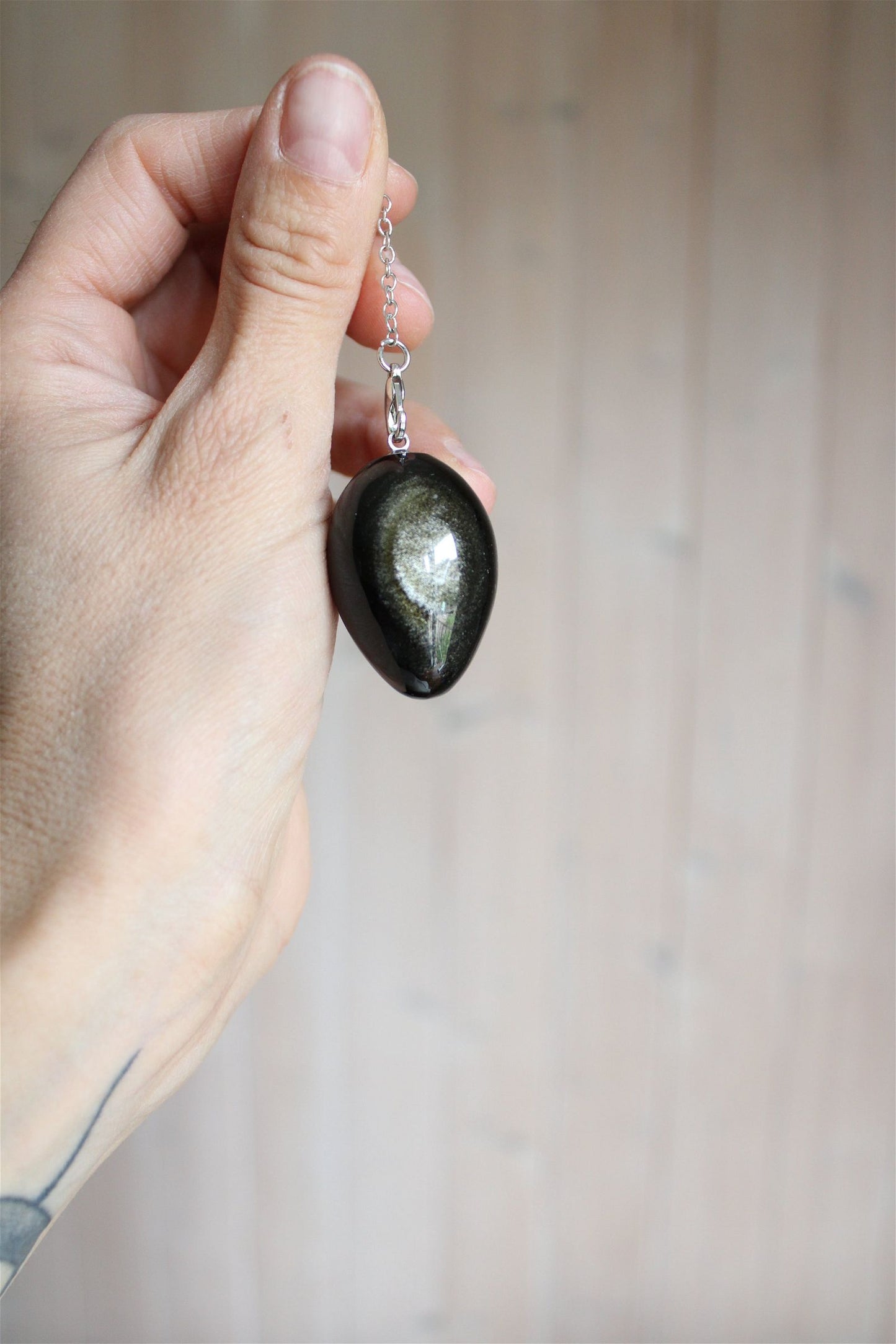 1 Pendule en obsidienne dorée gravé d'une Fleur de Vie - Aurore Lune