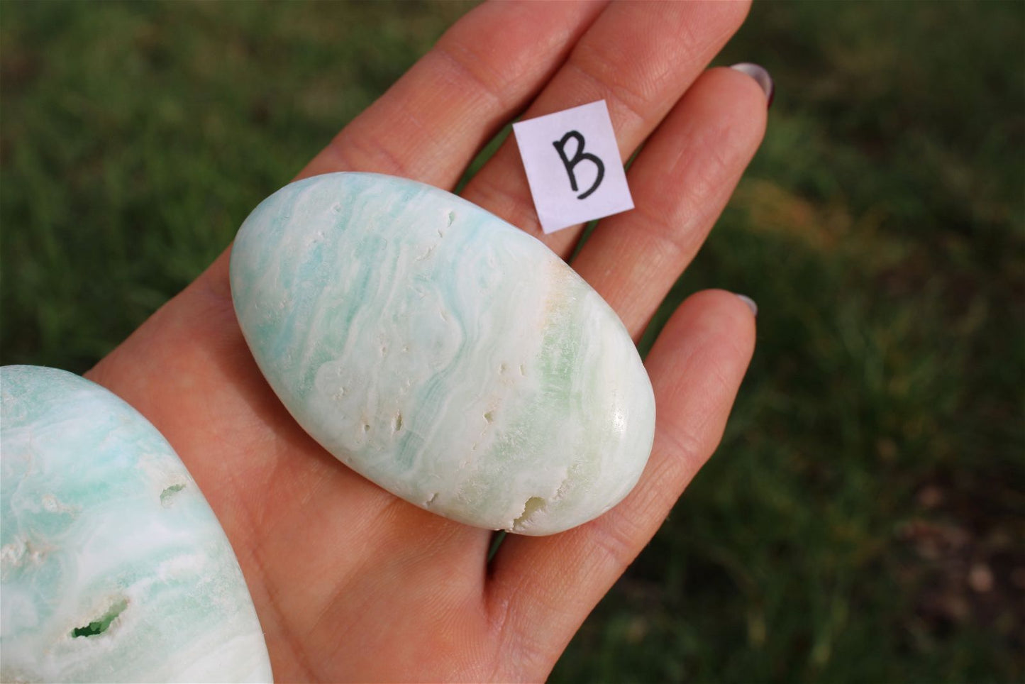 1 galet calcite des Caraïbes au choix - Aurore Lune