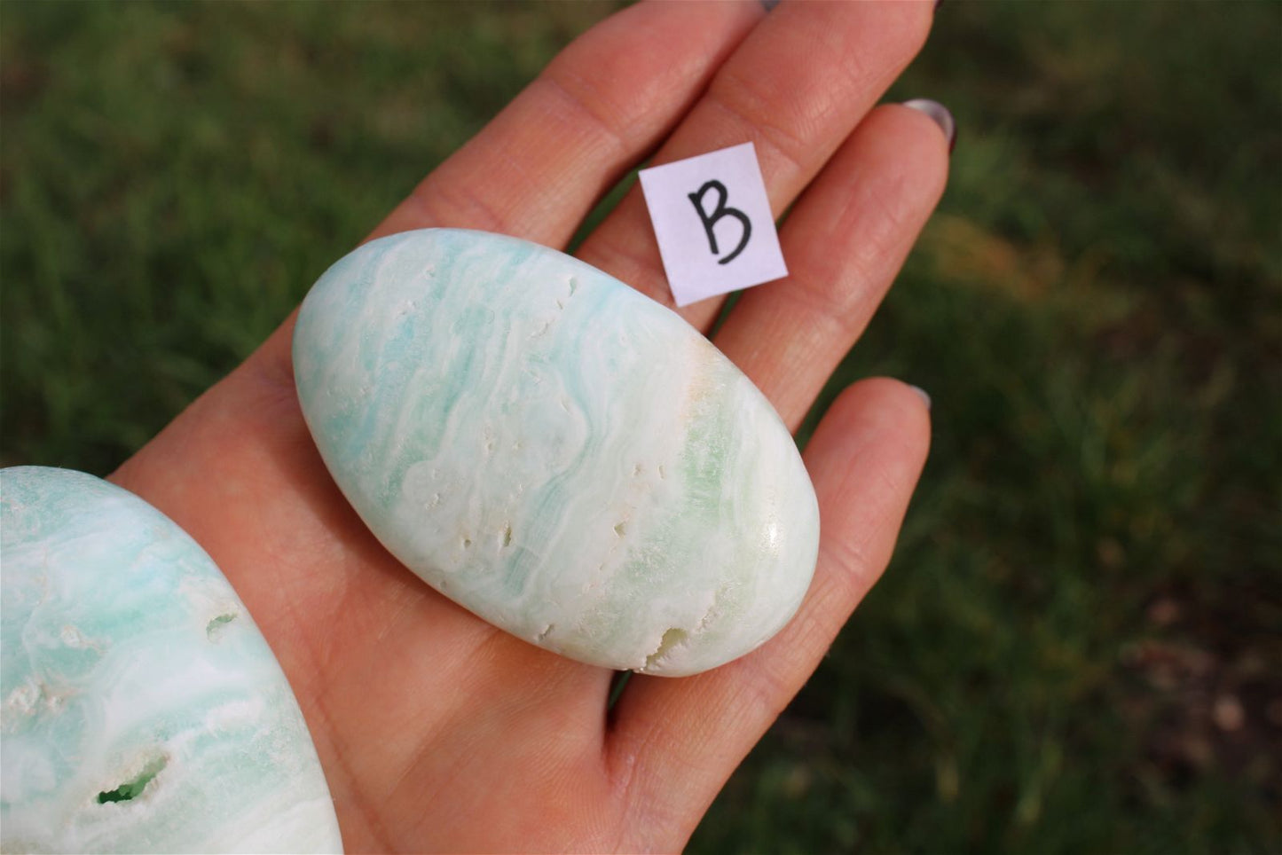 1 galet calcite des Caraïbes au choix - Aurore Lune