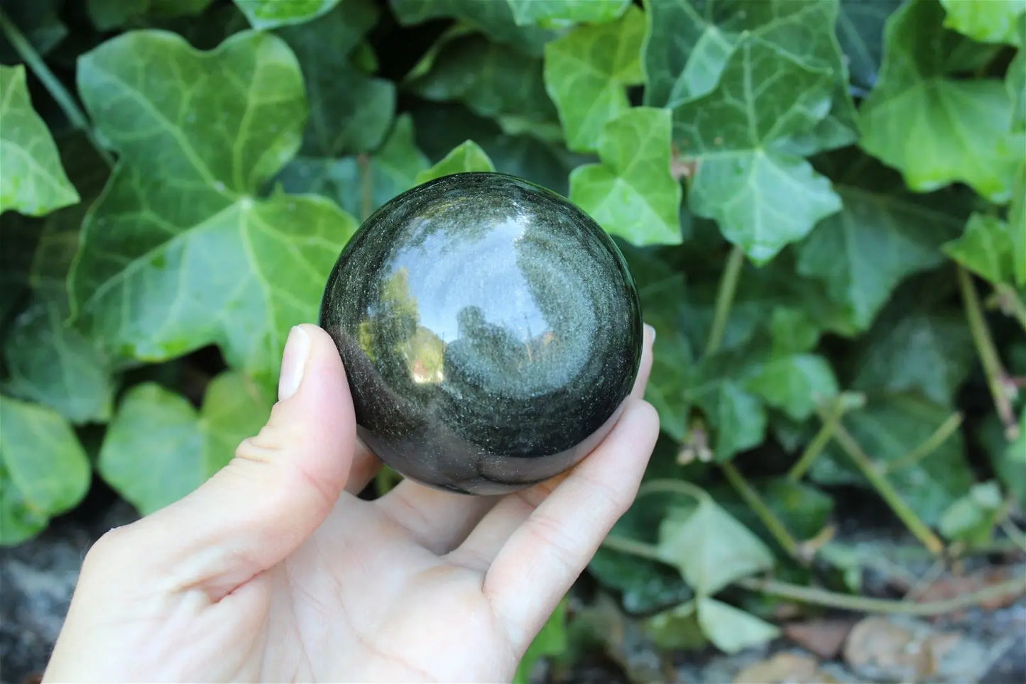 C. Sphère en obsidienne dorée 7 cm 290 grammes - Aurore Lune