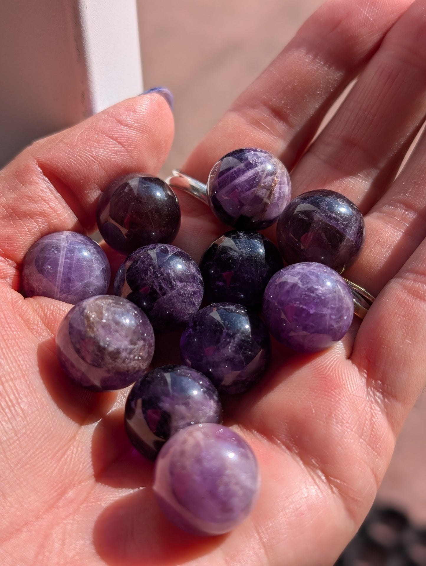 Kleine Mineralkugeln, Rosenquarz, Amethyst, Tigerauge, Karneol
