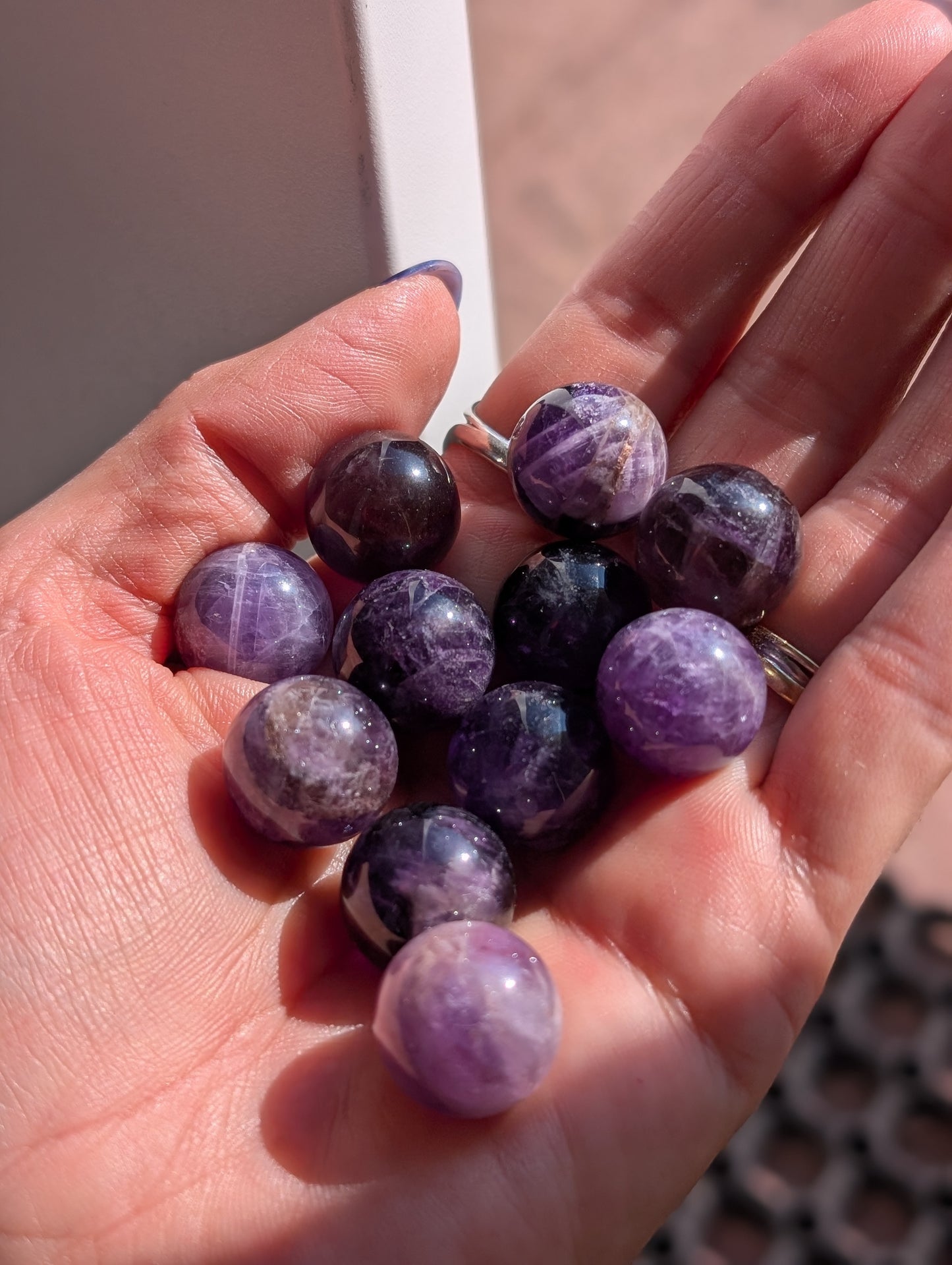 Kleine Mineralkugeln, Rosenquarz, Amethyst, Tigerauge, Karneol
