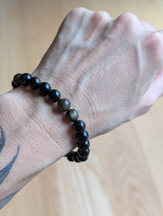 1 bracelet en obsidienne dorée 17 cm