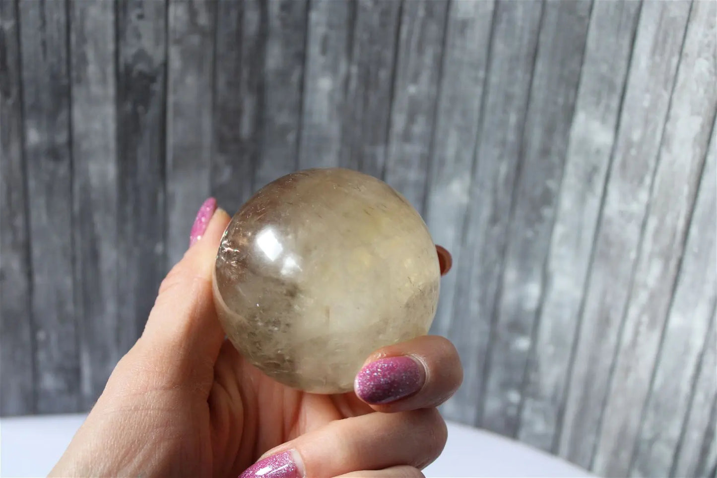 Sphère de citrine 6.5 cm - 295 grammes avec socle doré - Aurore Lune