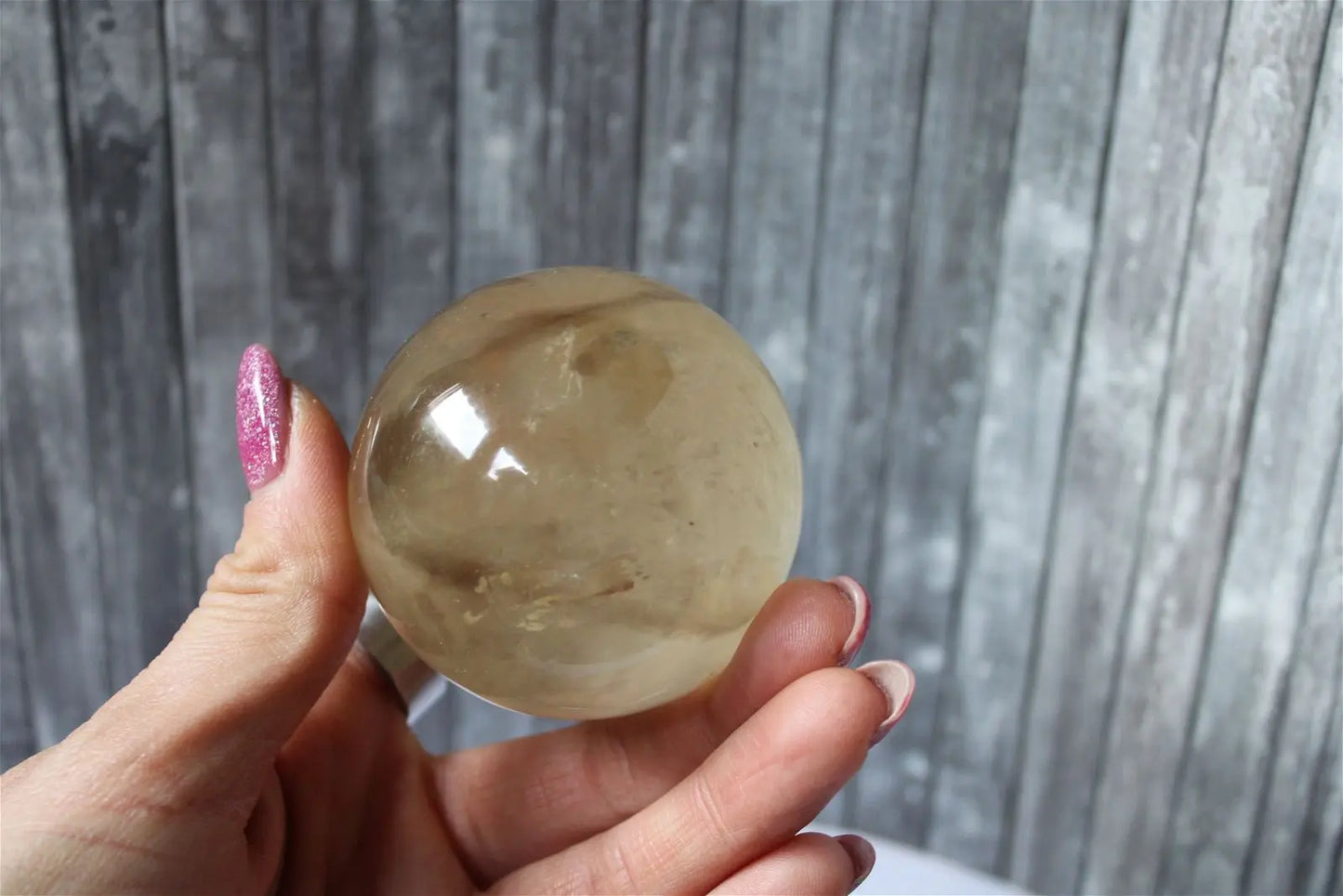 Sphère de citrine 6.5 cm - 295 grammes avec socle doré - Aurore Lune