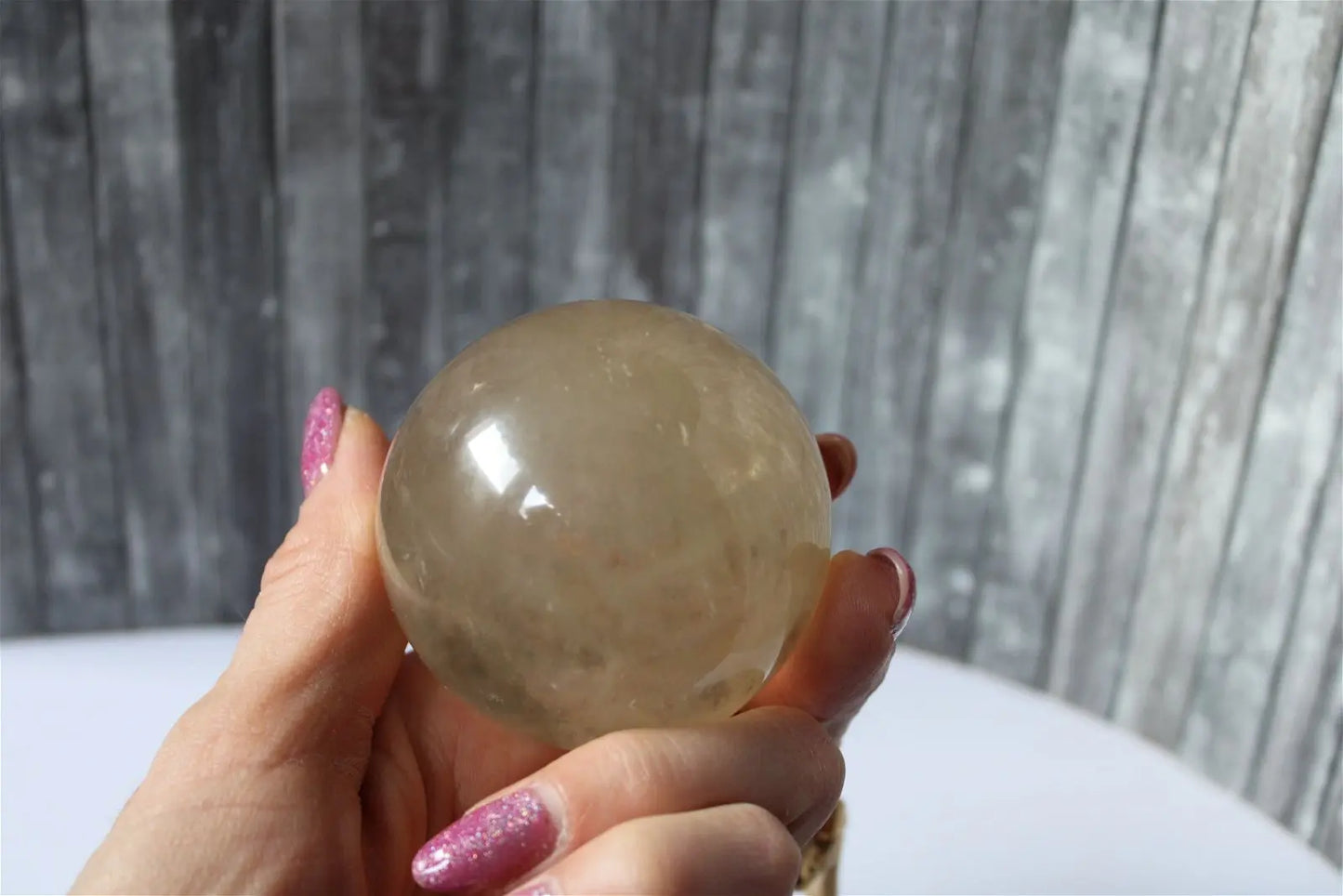 Sphère de citrine 6.5 cm - 295 grammes avec socle doré - Aurore Lune
