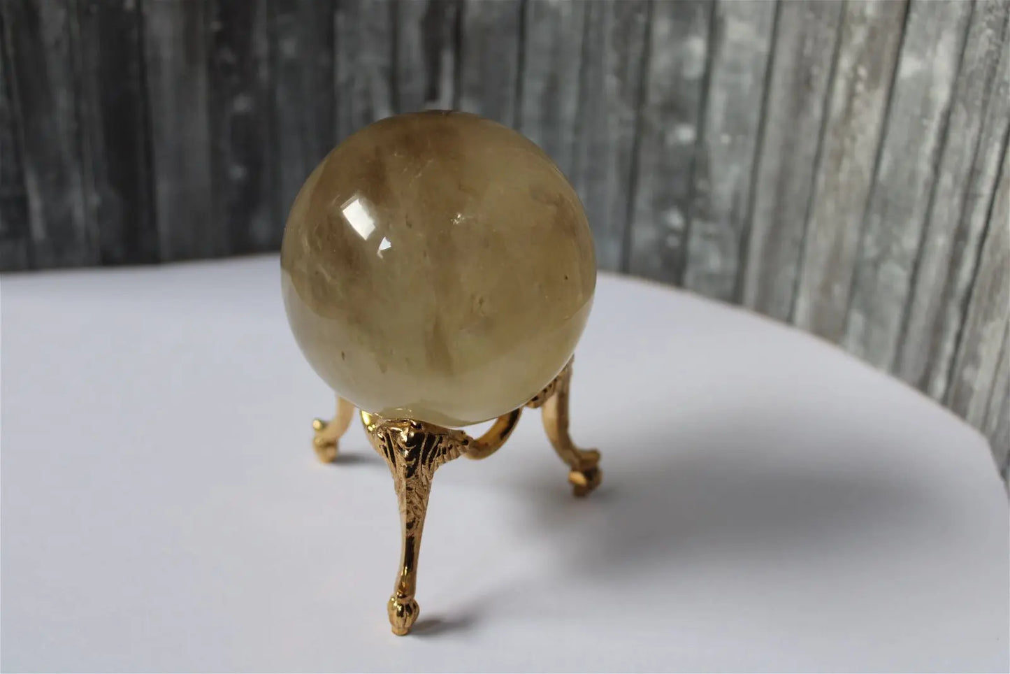 Sphère de citrine 6.5 cm - 295 grammes avec socle doré - Aurore Lune