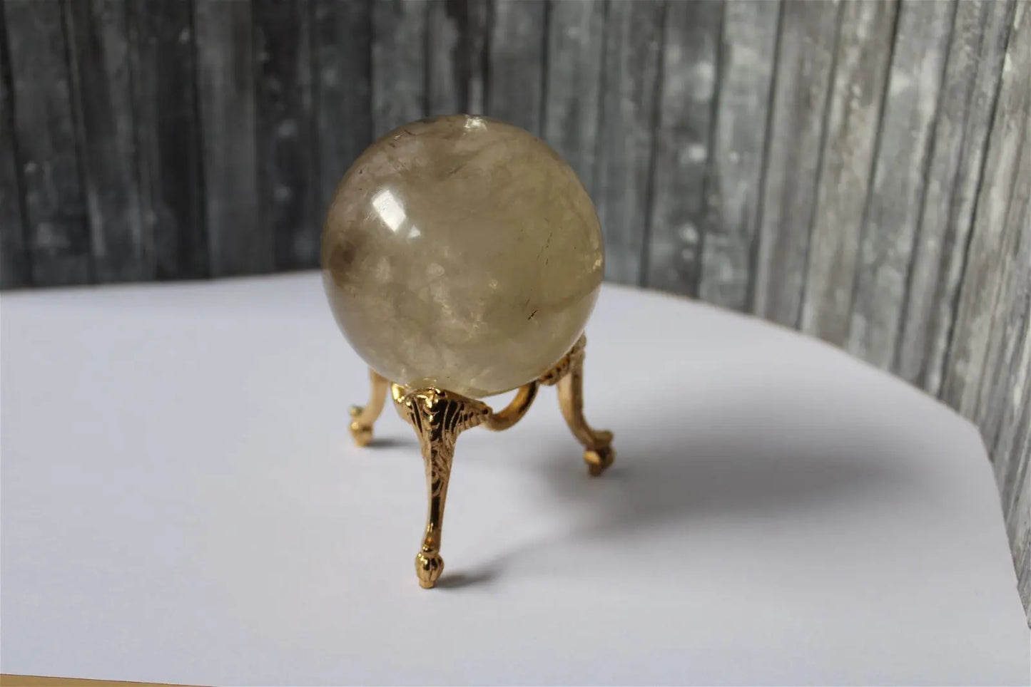 Sphère de citrine 6.5 cm - 295 grammes avec socle doré - Aurore Lune