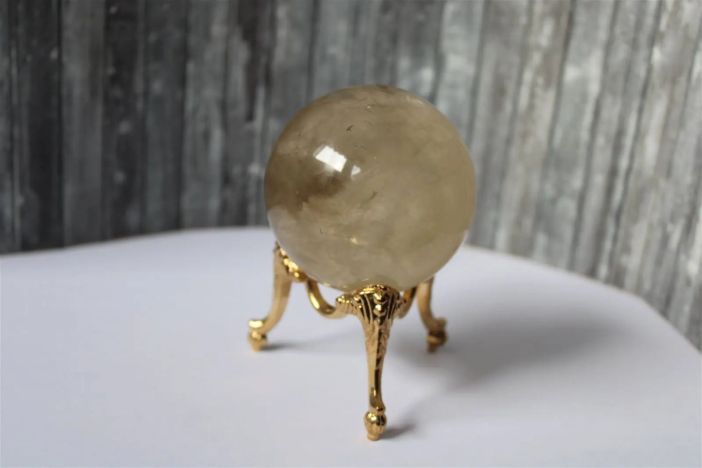 Sphère de citrine 6.5 cm - 295 grammes avec socle doré - Aurore Lune