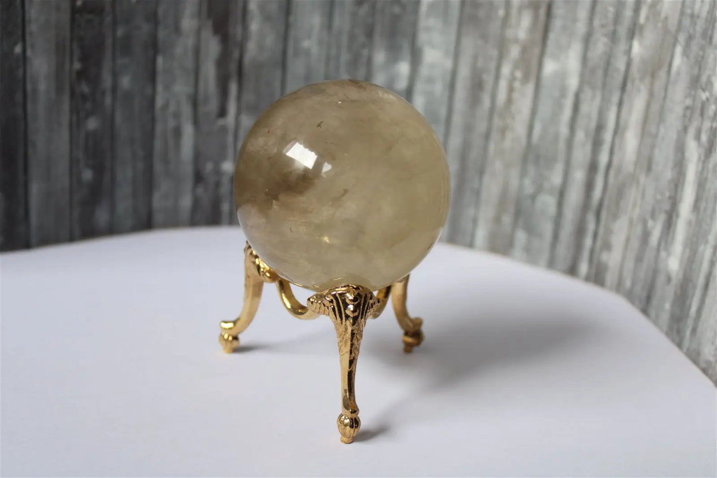 Sphère de citrine 6.5 cm - 295 grammes avec socle doré - Aurore Lune