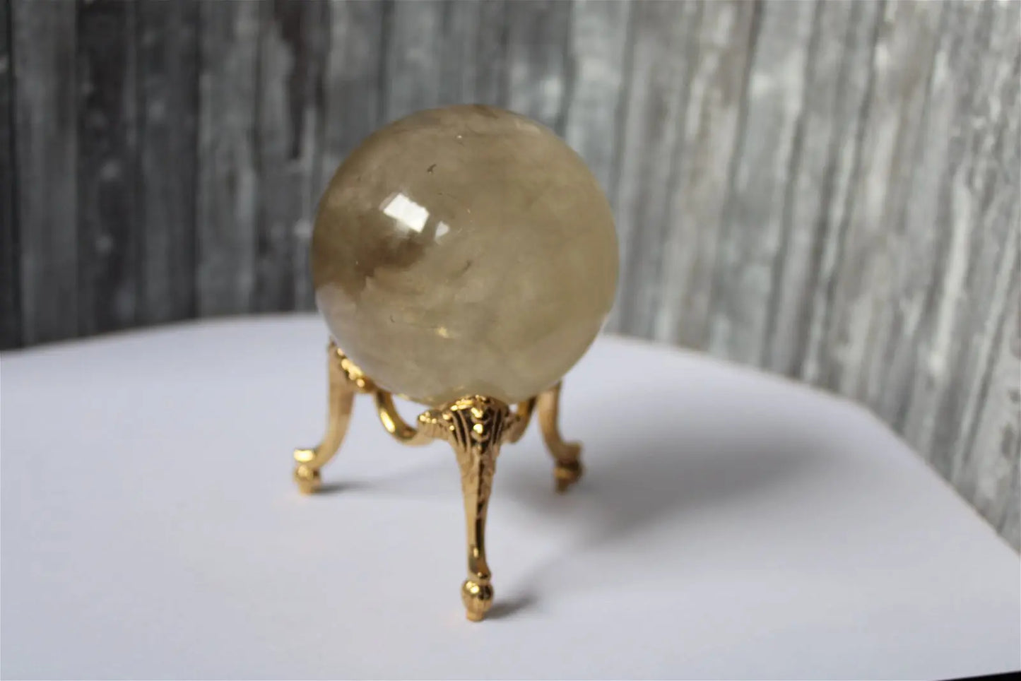 Sphère de citrine 6.5 cm - 295 grammes avec socle doré - Aurore Lune