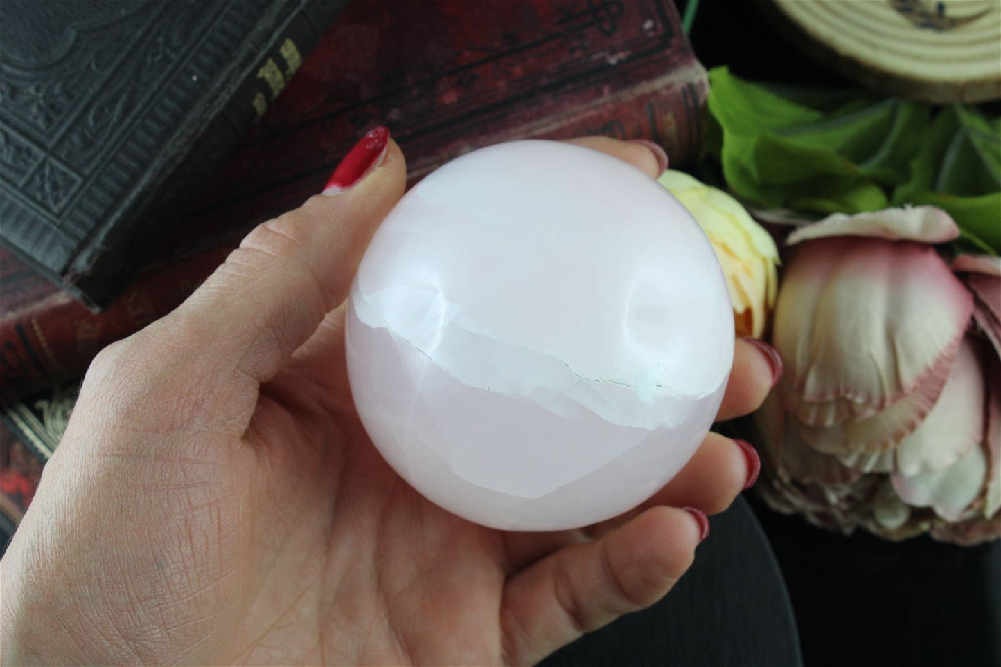 Sphère en manganocalcite 7 cm - Aurore Lune