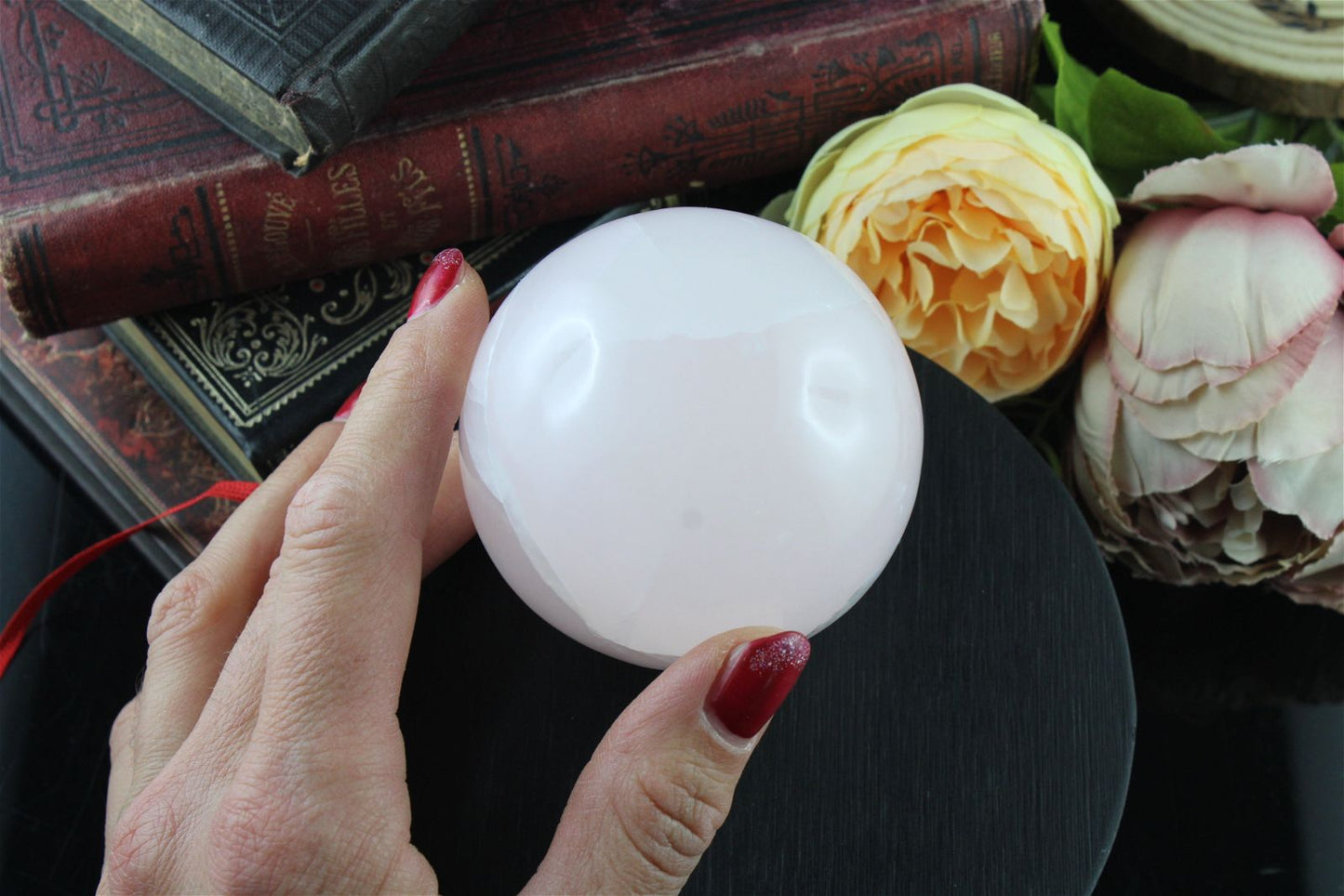 Sphère en manganocalcite 7 cm - Aurore Lune