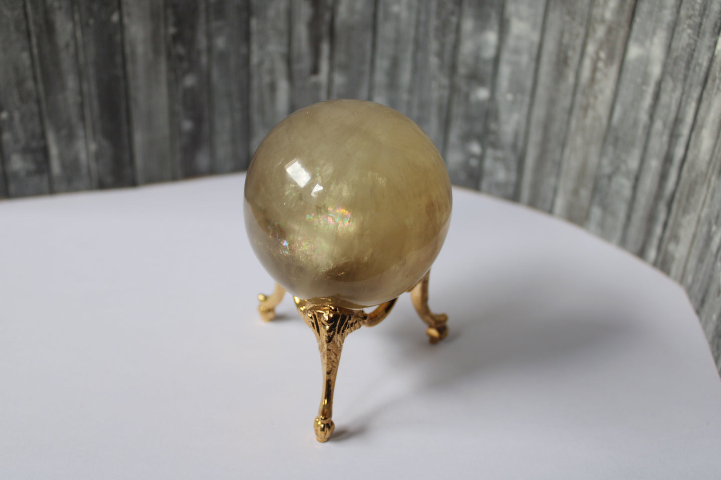 Sphère de citrine 6.5 cm - 295 grammes avec socle doré
