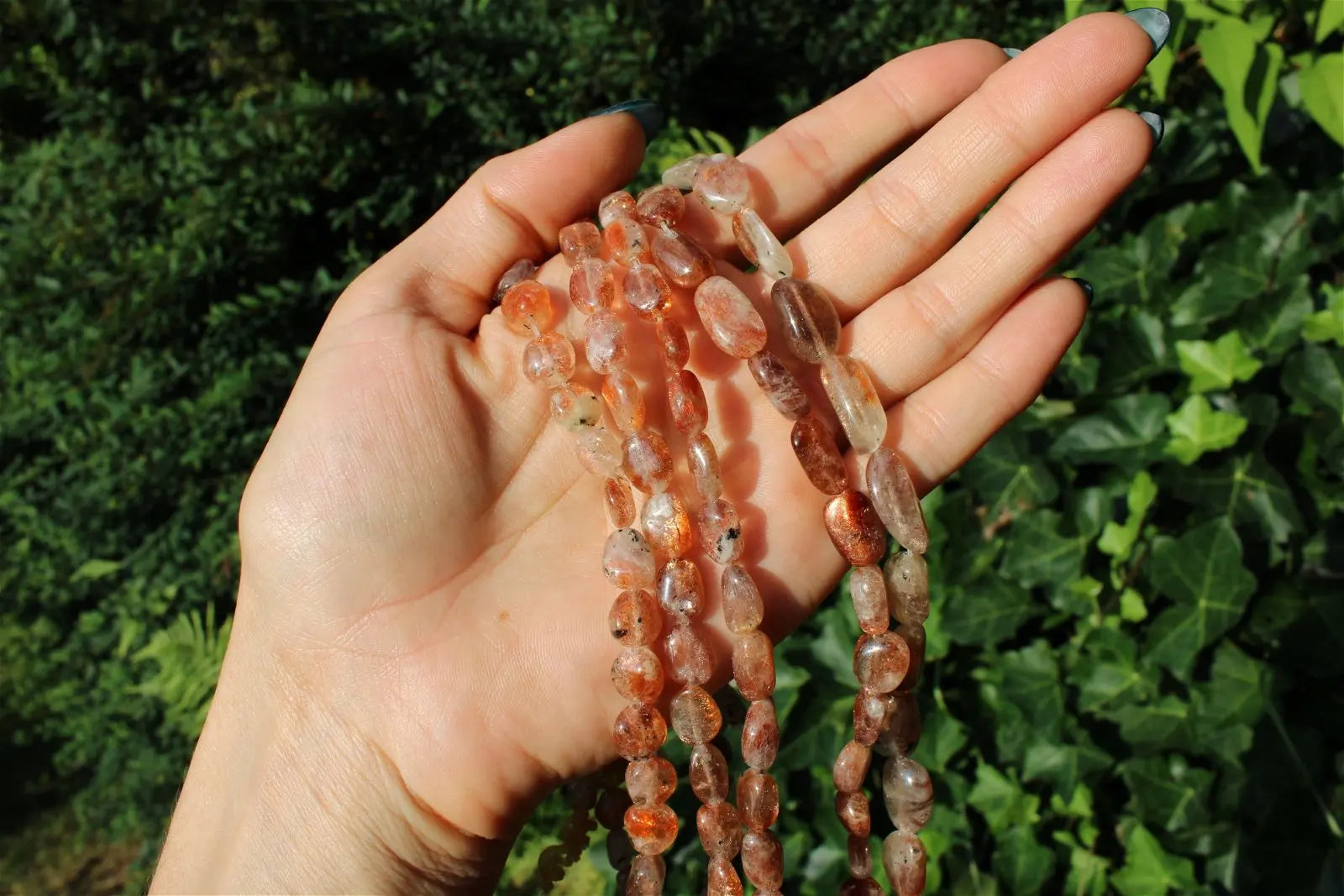 1 fil de perles de Pierre de soleil véritable