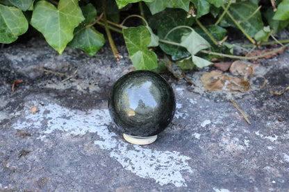C. Sphère en obsidienne dorée 7 cm 290 grammes - Aurore Lune 