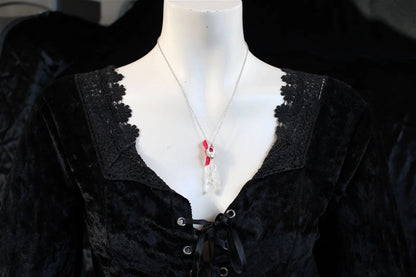 Collier cristal de roche "plastifié " en surface soie et scarabée - Aurore Lune 