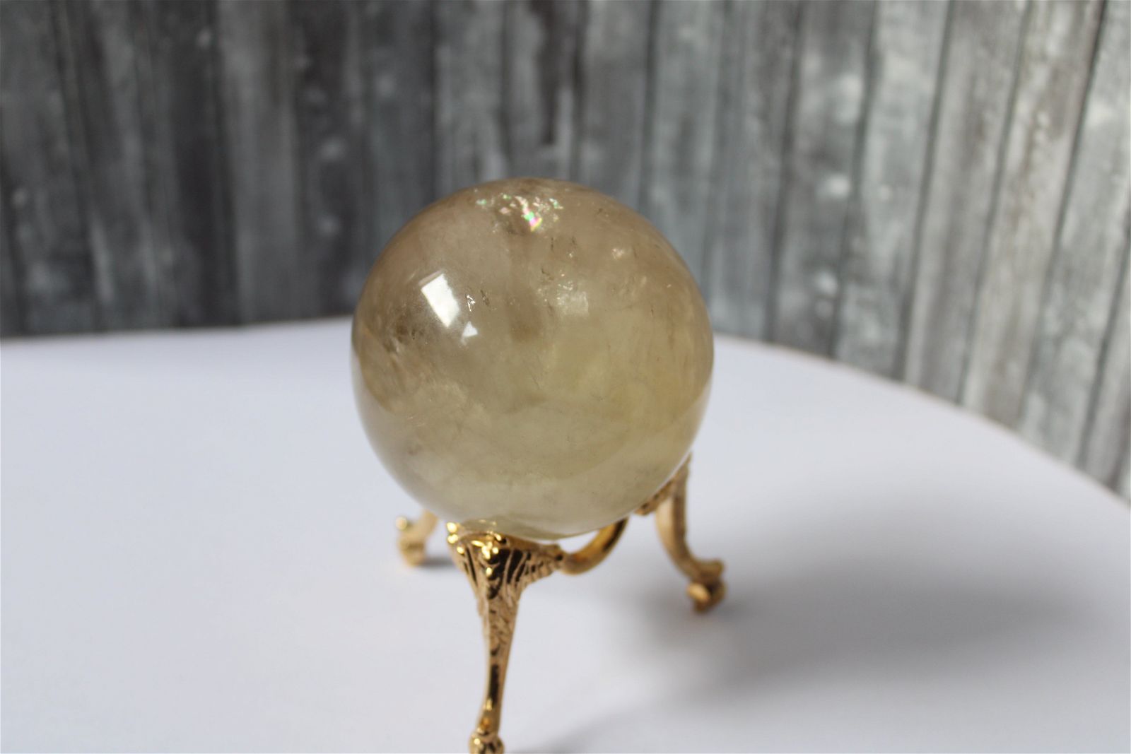 Sphère de citrine 6.5 cm - 295 grammes avec socle doré - Aurore Lune 