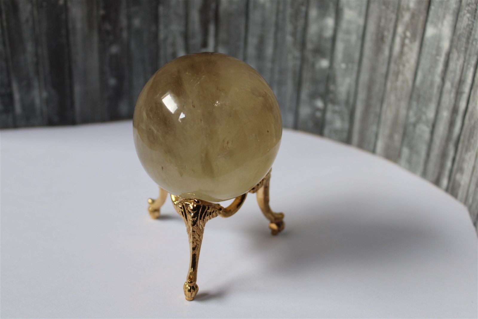 Sphère de citrine 6.5 cm - 295 grammes avec socle doré - Aurore Lune 