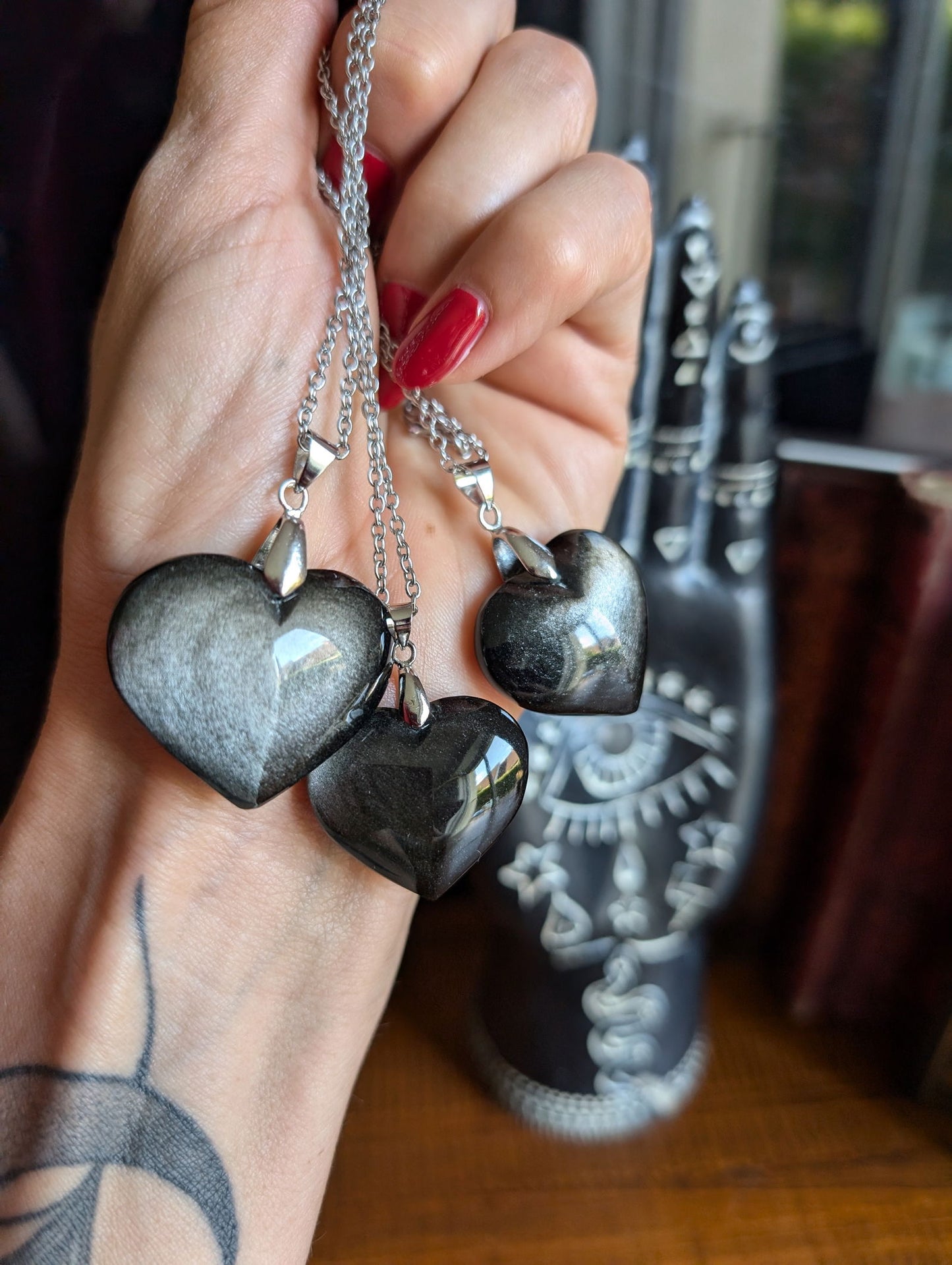 Un collier coeur en obsidienne argentée - Aurore Lune 