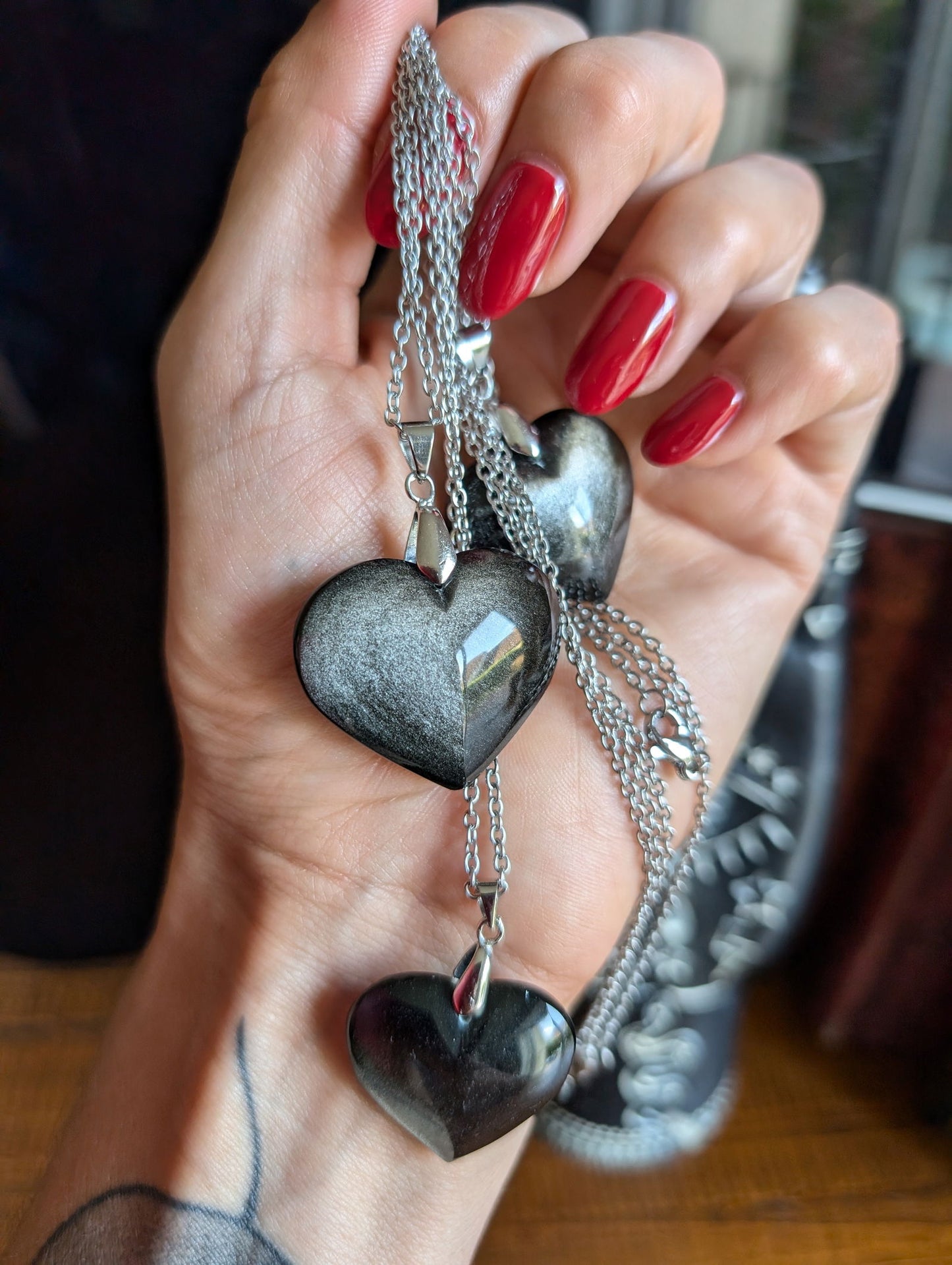Un collier coeur en obsidienne argentée - Aurore Lune 