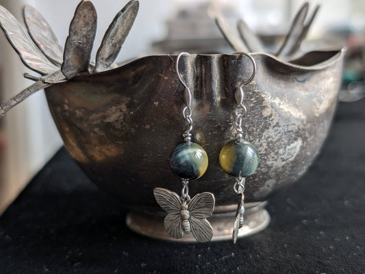 Boucles d'oreilles en oeil de faucon ou d'Horus et papillons