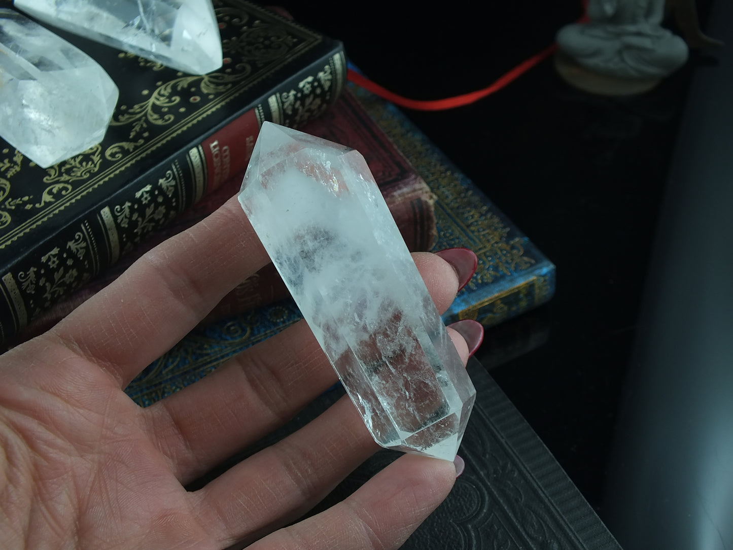 1 pointe de cristal de roche bi-terminée *C*
